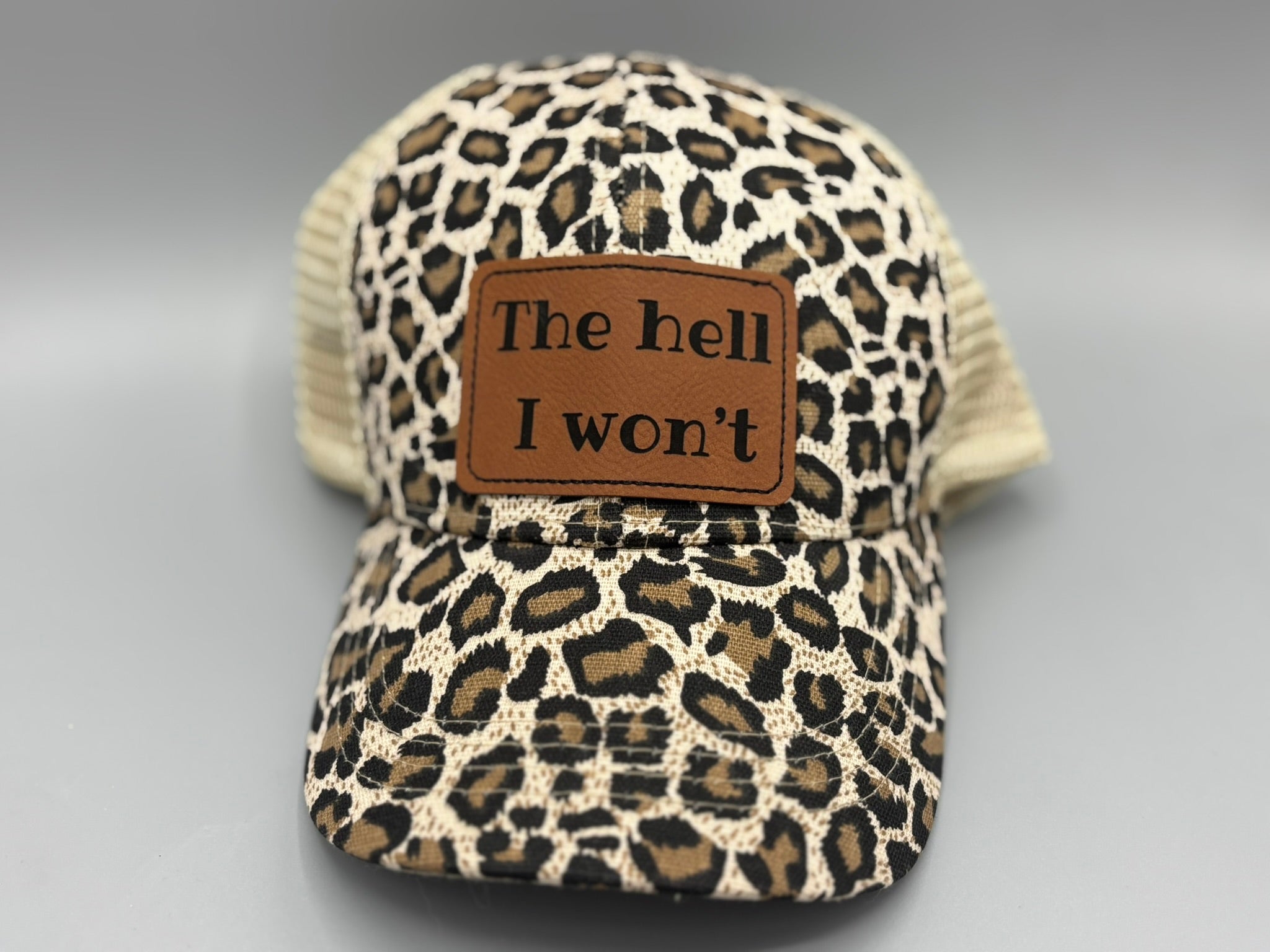 💣  “The Hell I Won’t” Leopard Print Ponytail Trucker Hat