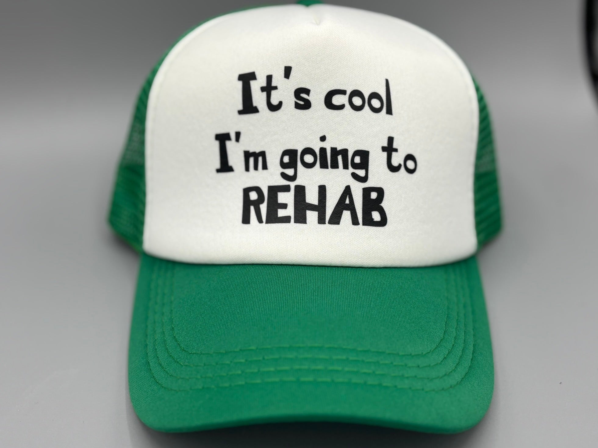 🌀 “It’s Cool, I’m Going to Rehab” Trucker Hat